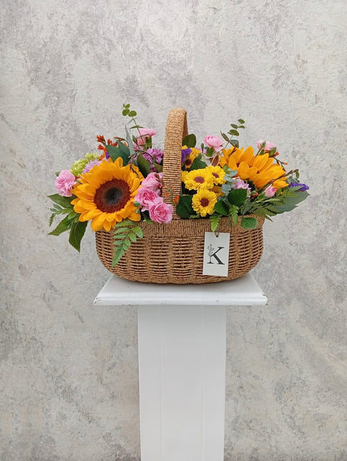 Canasta Ovalada de Girasoles y mix floral primaveral  cod CFOGMP01