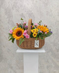 Canasta Ovalada de Girasoles y mix floral primaveral  cod CFOGMP01