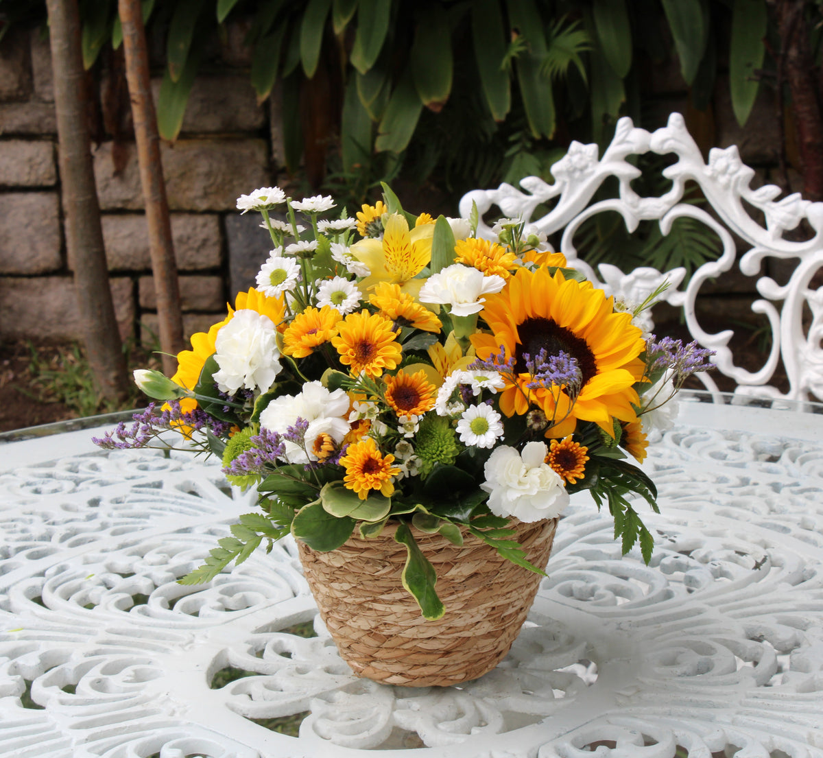 Small basket of Sunflowers, Daisies, and Carnations code CGM01