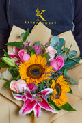 Ramo de 2 Girasoles, 6 rosas y 1 lirio